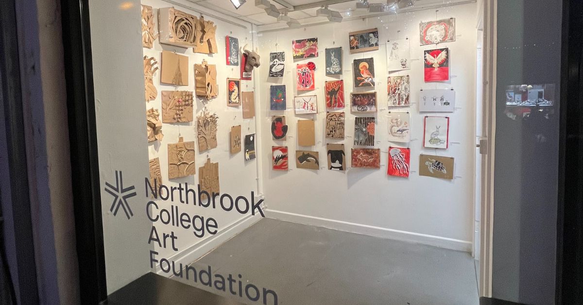 A picture of the exhibition featuring student's artwork