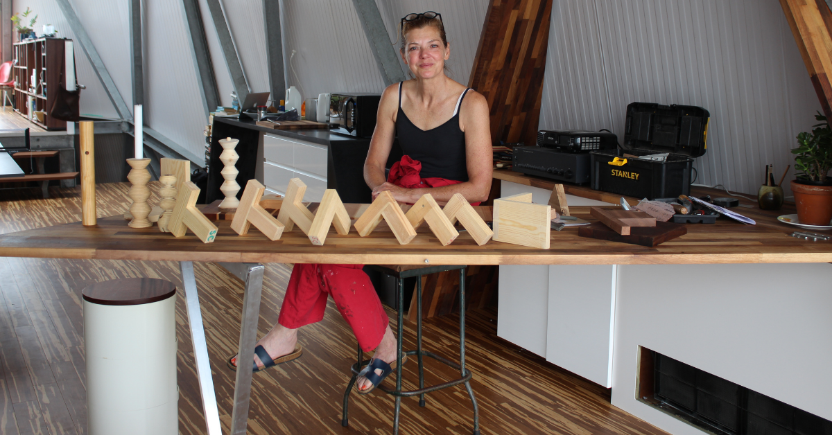 Sarah sat with some of her woodwork from her course