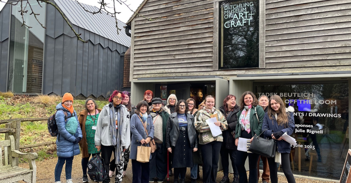 Some of the college's students and staff stood outside the museum