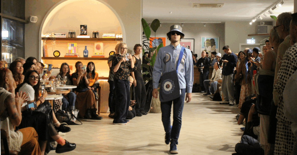 A model exhibiting one of the student's work at the event held on the Monday